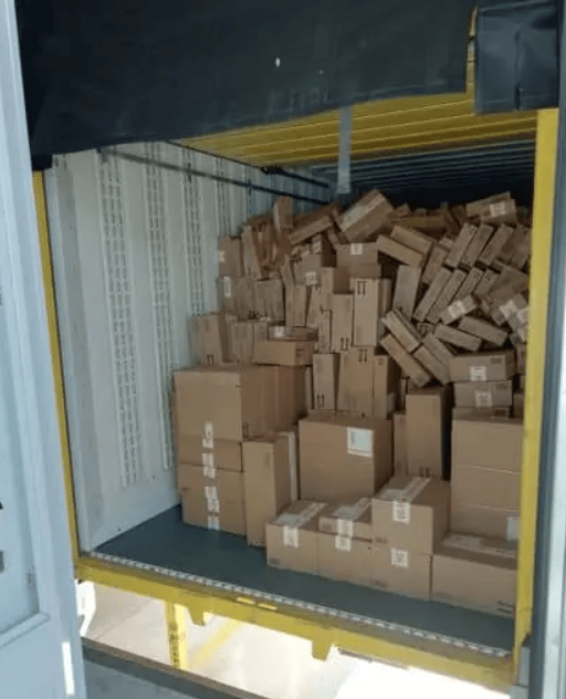 Clattered parcels in container automated truck unloading packages